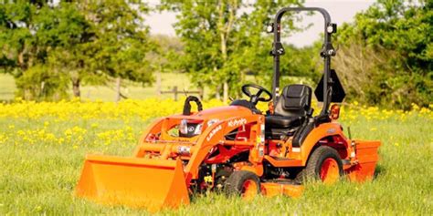 GREAT lawn tractor and snow moving machine. . Kubota bx2380 front loader lift capacity